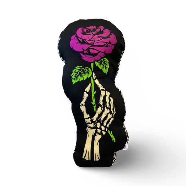 printed pillow image of skeleton hand holding pink rose side of pillow printed ivory and black stripe pattern and back pillow is black with ivory polkadot print measures 20 inch tall and 3 inch thick very unique halloween home decor goth decor plush pillow