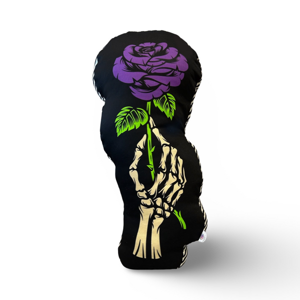 printed pillow image of skeleton hand holding purple rose side of pillow printed ivory and black stripe pattern and back pillow is black with ivory polkadot print measures 20 inch tall and 3 inch thick very unique halloween home decor goth decor plush pillow