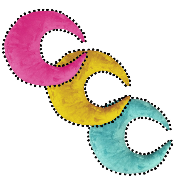 moon plush pillows in bright colors with black pompom trim, colors are pink, teal and golden yellow. these pillows are soft, and spooky but also magical and sweet and funky