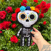 12 inch tall day of the dead skeleton plush with custom face printing satin lace flower halo and in  black minky white embroidery beautiful embroidery high quality plush halloween skeleton bat plushie halloween goth home decor childrens halloween dia de lost muertos skeleton plush day of the dead plush skeleton plush toy