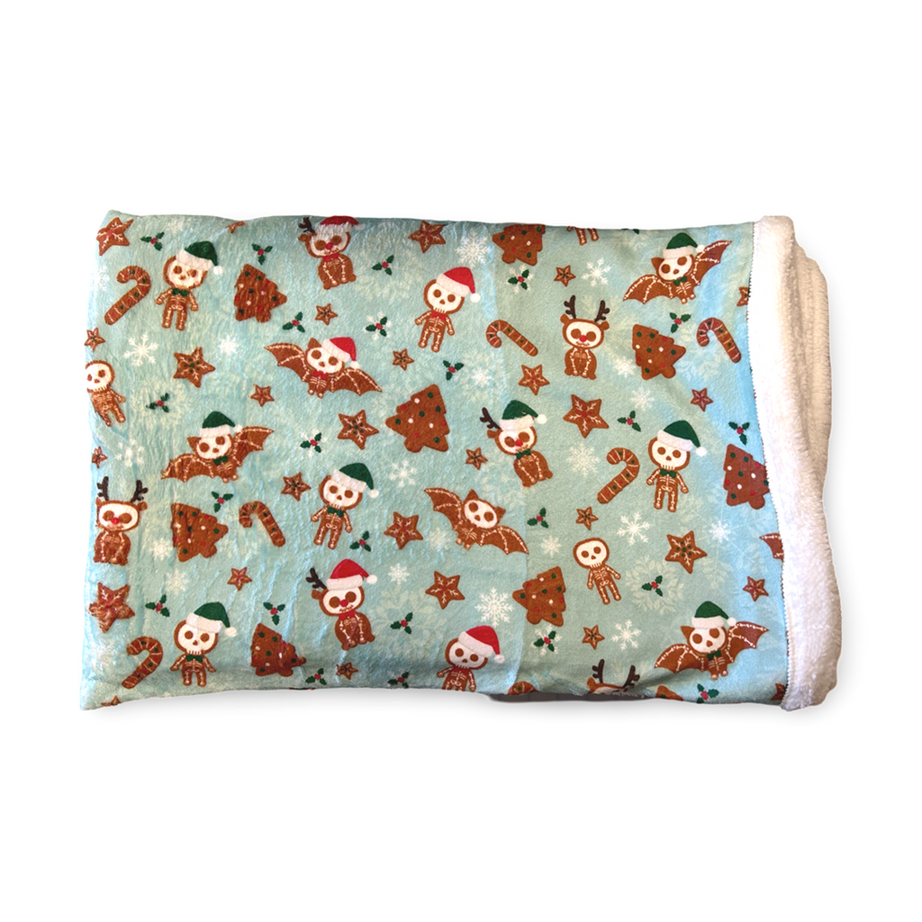 colorful gingerdead creepmas print throw with white sherpa fleece lining