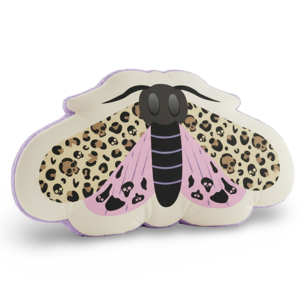 Decorative pillow with moth design featuring leopard print and pink accents on a white background