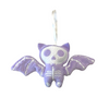 Purple bat-shaped plush toy with a skeleton design on a white background