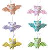 Set of colorful bat-shaped ornaments on a white background