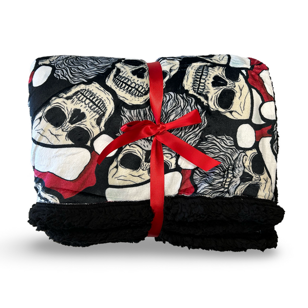 santa skeleton throw with spooky christmas toss print lined in black sherpa fleece, so soft!