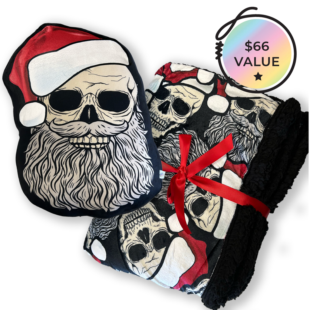 skeleton santa gift set includes a santa skeleton print shaped pillow and a  deluxe blanket with sherpa fleece