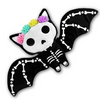 Bat-shaped toy with skeleton design and colorful flowers on a white background