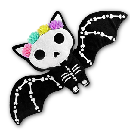 Bat-shaped toy with skeleton design and colorful flowers on a white background