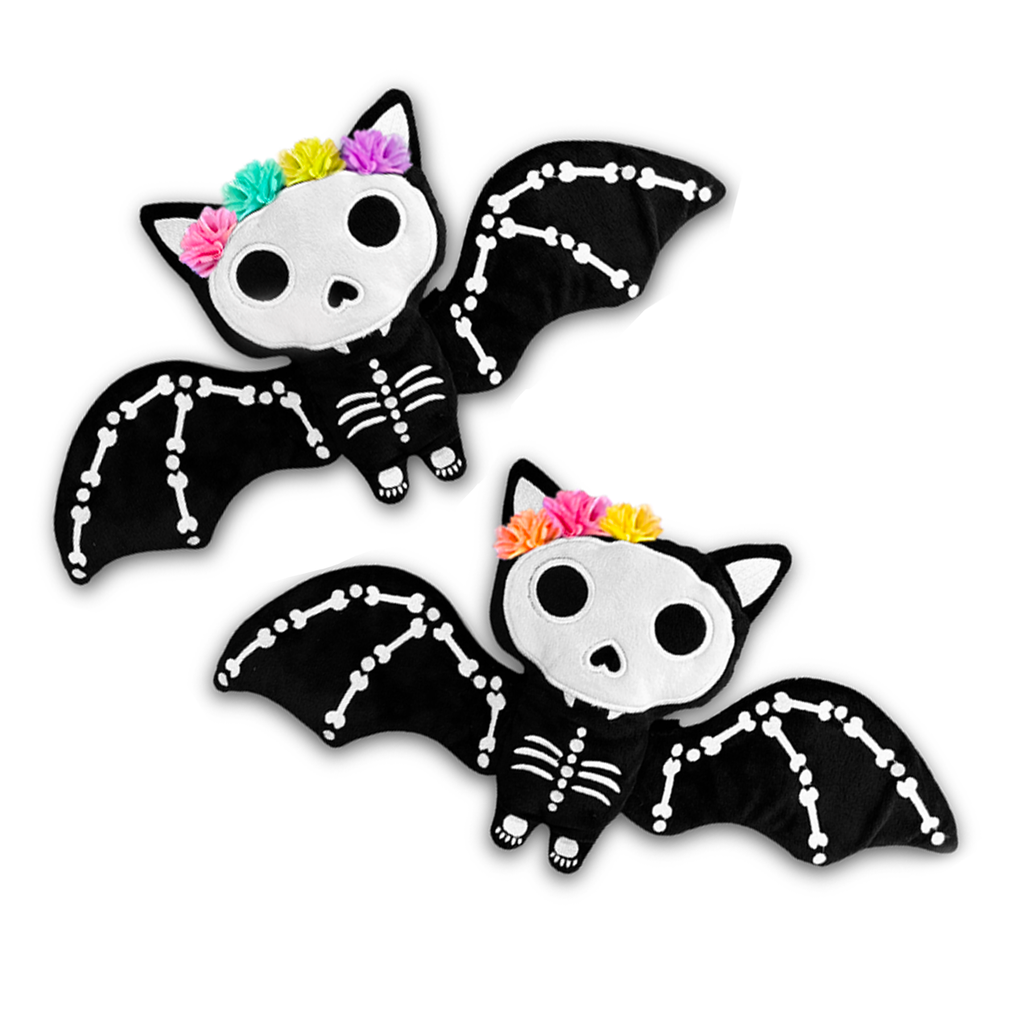 Two decorative bats with skeleton designs and colorful hair on a white background