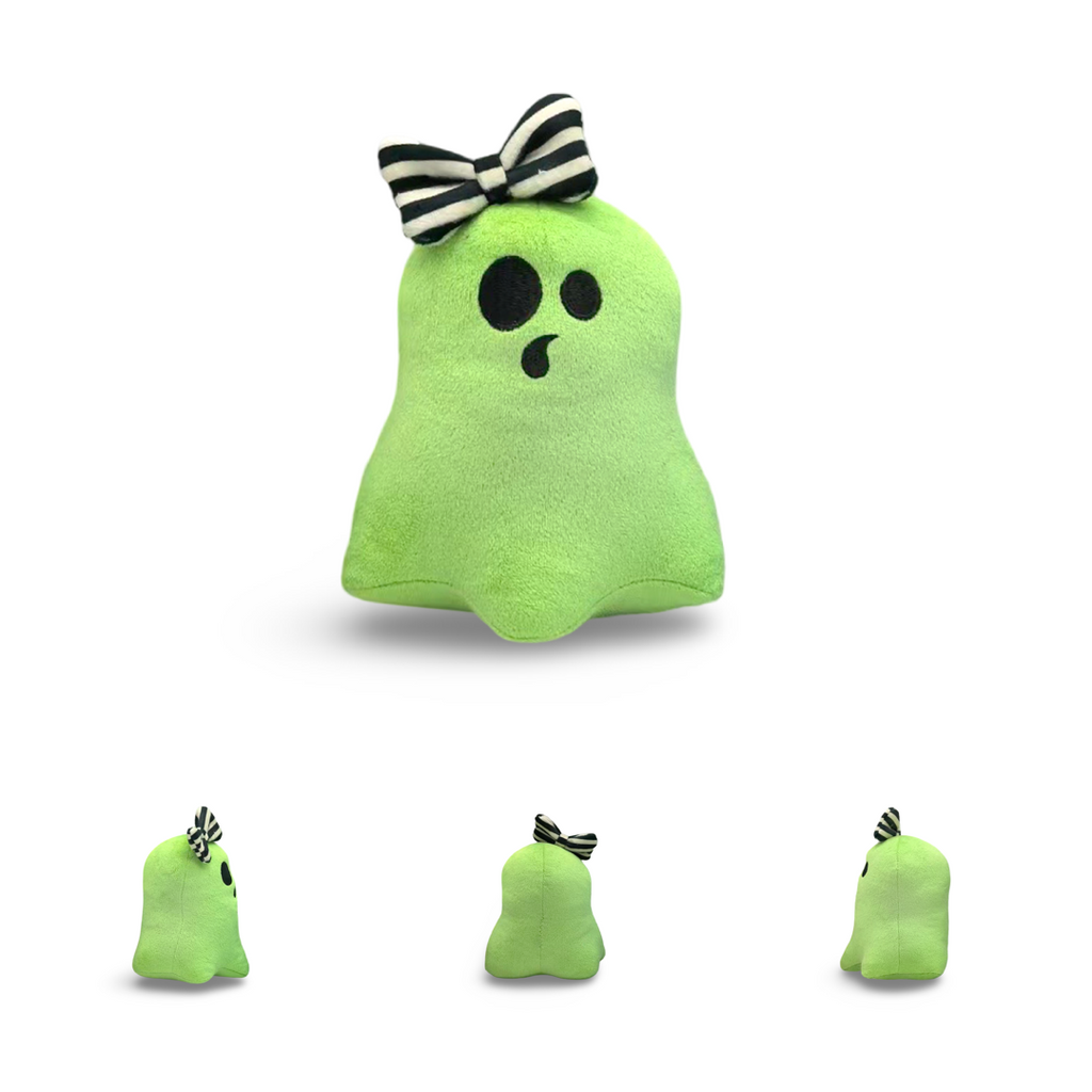 Green ghost plush toy with a black and white bow on a white background